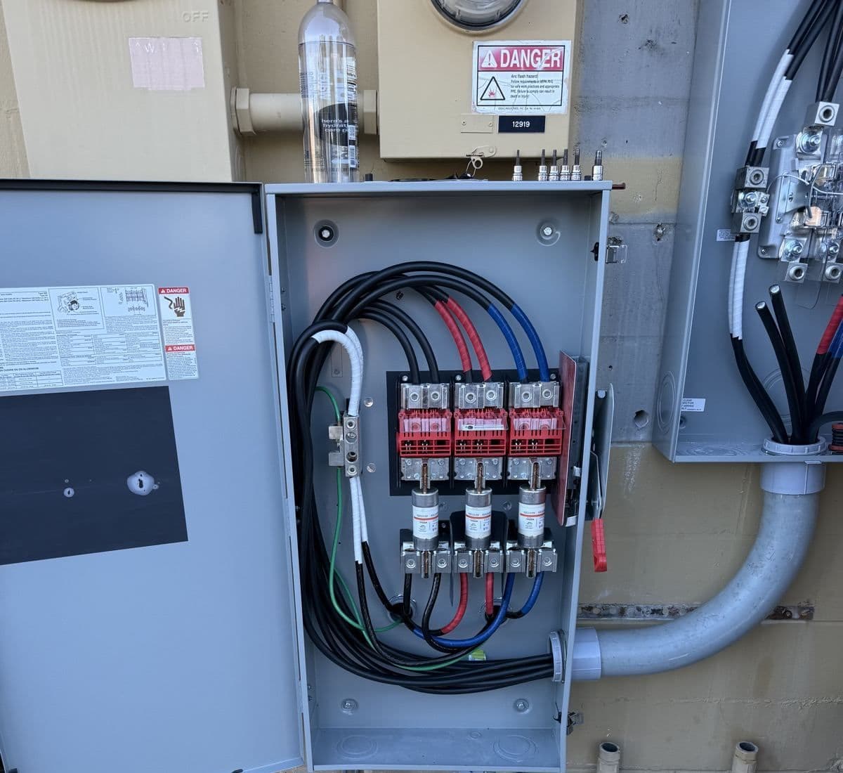 Service entrance with new wiring and disconnects